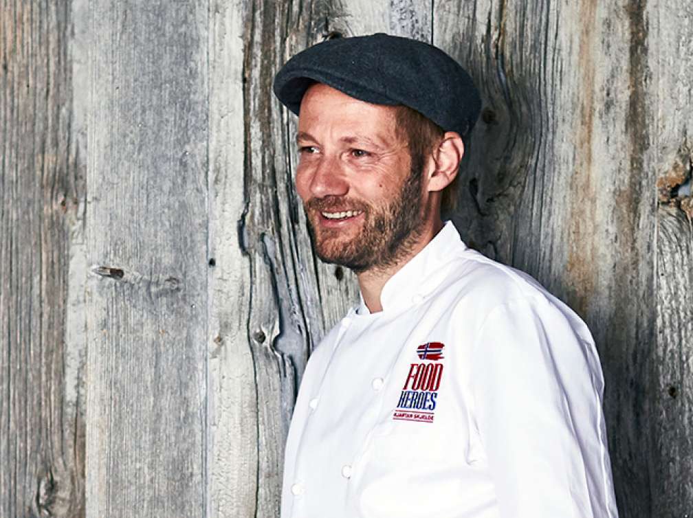 Local food hero Kjartan stood against wall