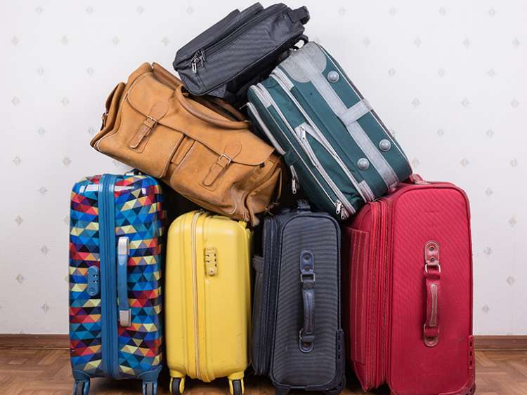 Suitcases piled together