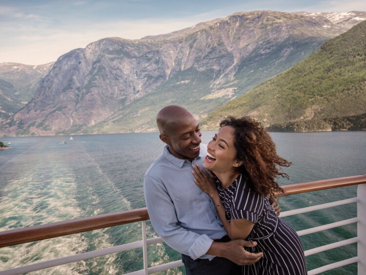Couple laughing together on cruise