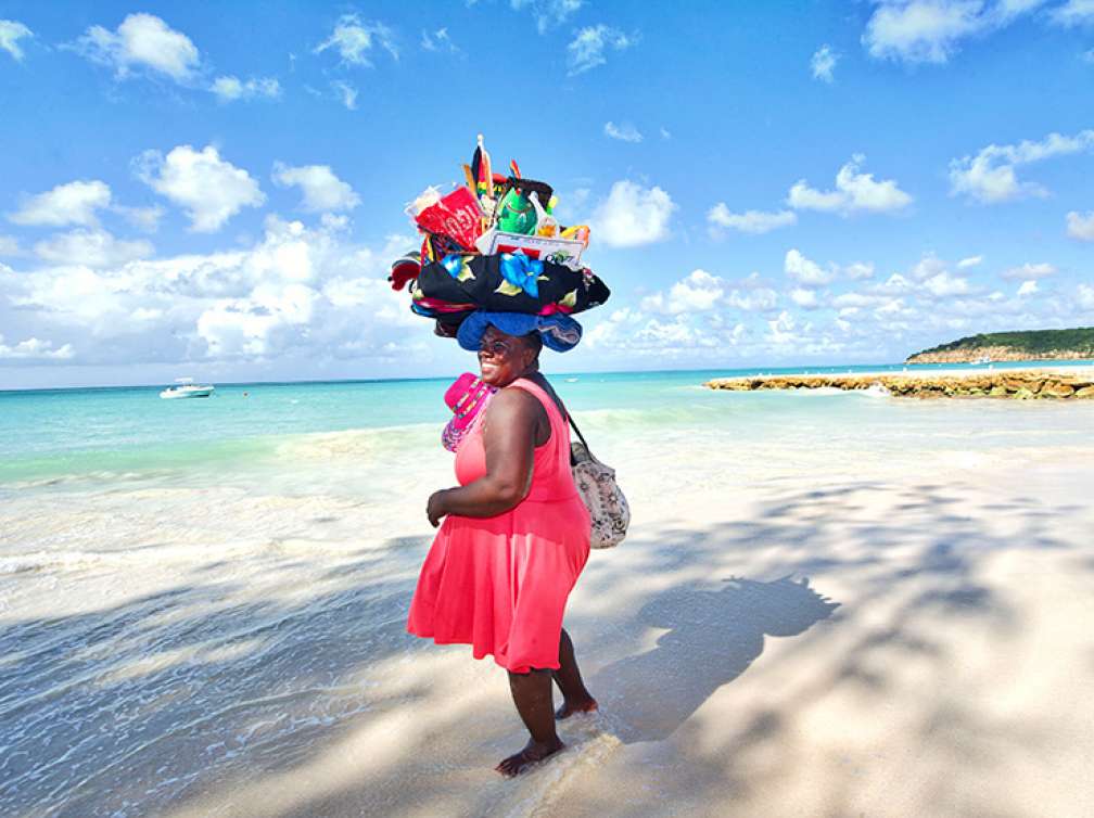 Beach seller on beach in Caribbean