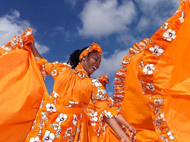 Lady dancing in the Caribbean