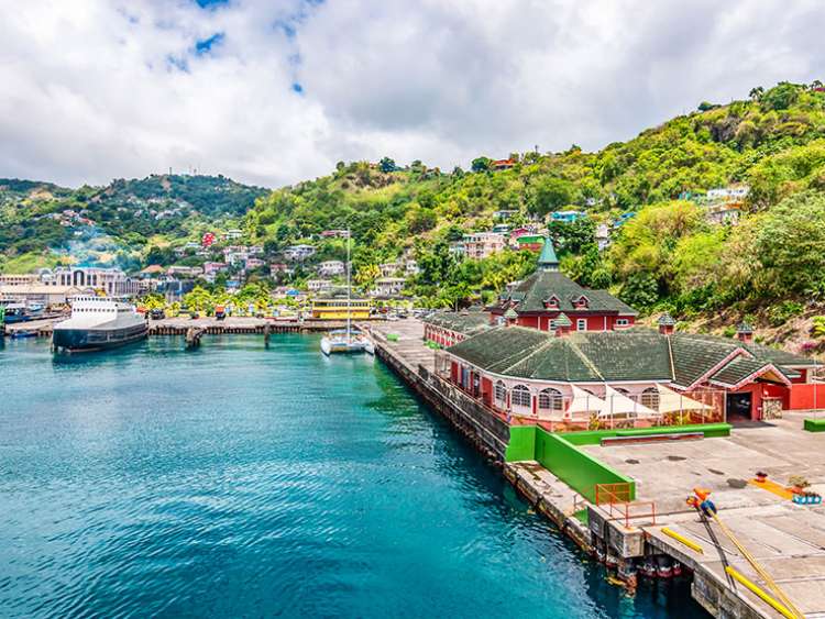 Harbor landscape and cruise port of Kingstown, Saint Vincent and the Grenadines. Bright and colorful travel image. Clouds sky.