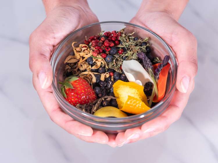 Rose Sainte Marie botanicals in a glass bowl