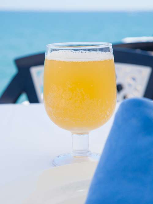 Cold beer in the chiringuito, near Sitges a perfect day in Catalonian coast.