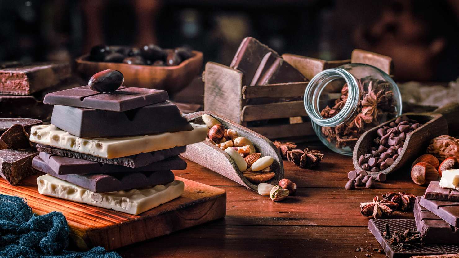 Assorted chocolate, nuts and dried fruit in old fashioned style