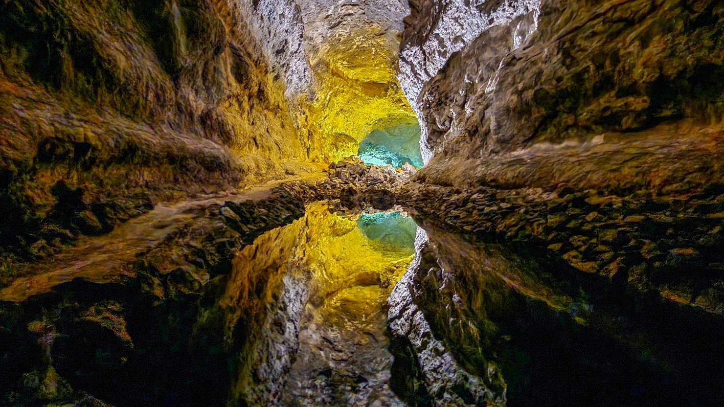 Cueva de los Verdes, underground lake with amazing water reflection.