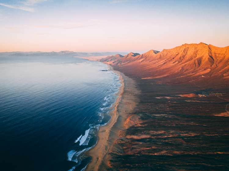 Aerial View Panorama Of Cofete Beach Valley In Fuerteventura shot in the evening time during sunset.