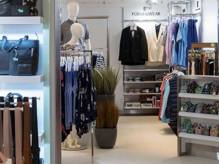 Top branded clothes and accessories in a shop on board P&O Cruises