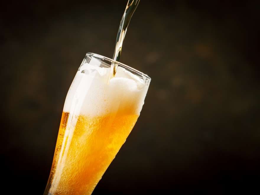 Pint of beer being poured