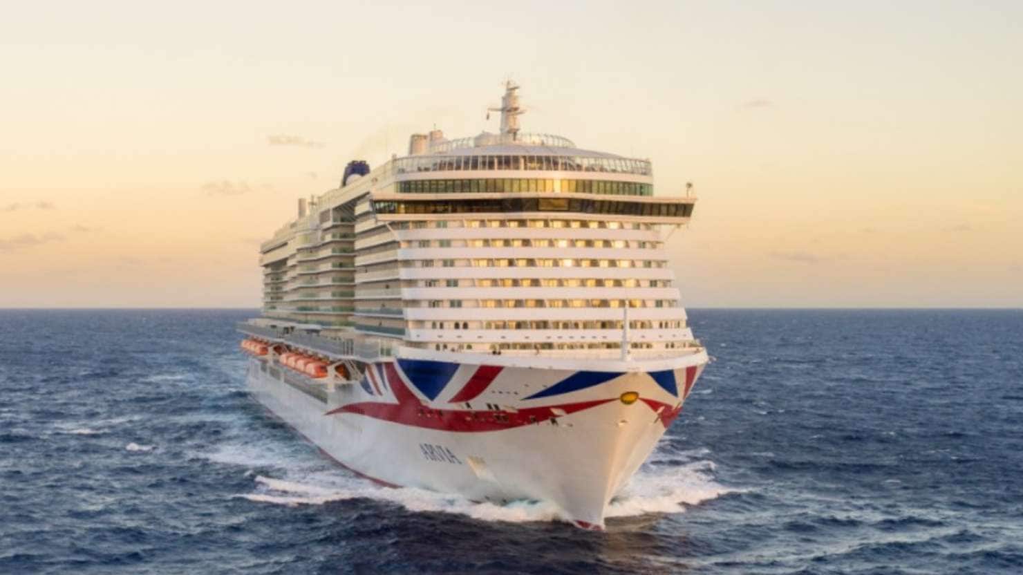 Arvia ship cutting through the ocean in a sunset setting