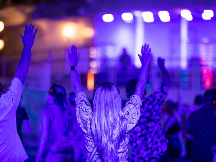 Press trip A319A on board Azura in the Mediterranean.
Day three in Mykonos, Greece. The silent disco.
Client: P&O Cruises.
Picture date: Saturday July 8, 2023.
Photograph by Christopher Ison ©
07544044177
chris@christopherison.com
www.christopherison.com
IMPORTANT NOTE REGARDING IMAGE LICENCING FOR THIS PHOTOGRAPH: This image is supplied to the client under the terms previously agreed. No sales are permitted unless expressly agreed in writing by the photographer. Sharing with third parties is prohibited without the written permission of the photographer.