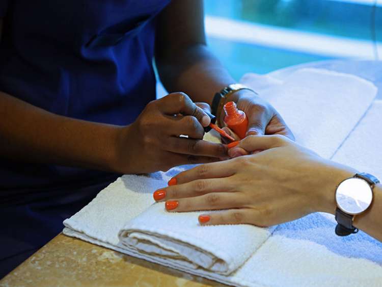 Woman having her nails painted at Oasis Spa on board Aurora
