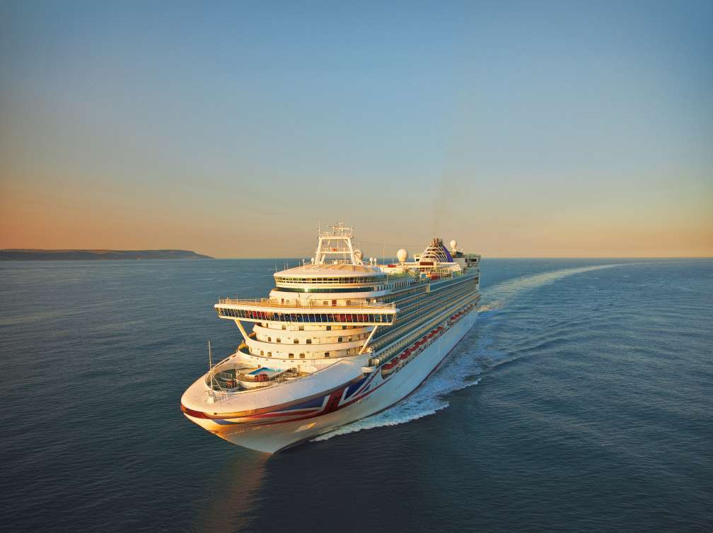 Front of P&O Cruises Ship sailing at sunset
