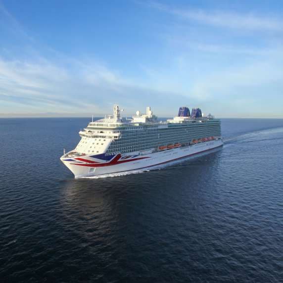 P&O Cruises Britannia cruise ship from port bow wide angle at sea