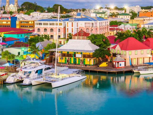 St. John's, Antigua and Barbuda town skyline on Redcliffe Quay at dusk.