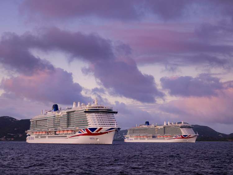 Ñ EDITORIAL FREE TO PUBLISH IMAGE --
As the sun sets, P&O Cruises two largest ships, Excel class Arvia and Iona depart from Tortola, British Virgin Islands, yesterday, Friday January 24, 2025. This is the first time there have been two P&O Cruises ships of this size in the same Caribbean port. 
Iona is on a 35 night Caribbean itinerary which left Southampton on January 11, 2025 and will call at Tenerife, Tortola, Barbados, St Lucia, Martinique, Antigua, St Kitts, St Maarten and La Coruna.
Arvia is based in the Caribbean each year from November through to March offering 14 night fly/cruise itineraries from Barbados. The ships, which each carry 5,200 guests and 1,800 crew, offer the choice of over 30 restaurants and bars.
Ship features include Altitude high ropes course 200 feet above sea level; Mission Control, an interactive immersive experience and Schhh, an evening experiential show which was originally created by Nicole Scherzinger who also named Arvia in a glittering ceremony in Barbados and attended by Olly Murs, Trevor Nelson and Sara Cox in 2023.
Picture date Friday 24th January, 2025.
Picture by Christopher Ison. Contact +447544 044177 chris@christopherison.com