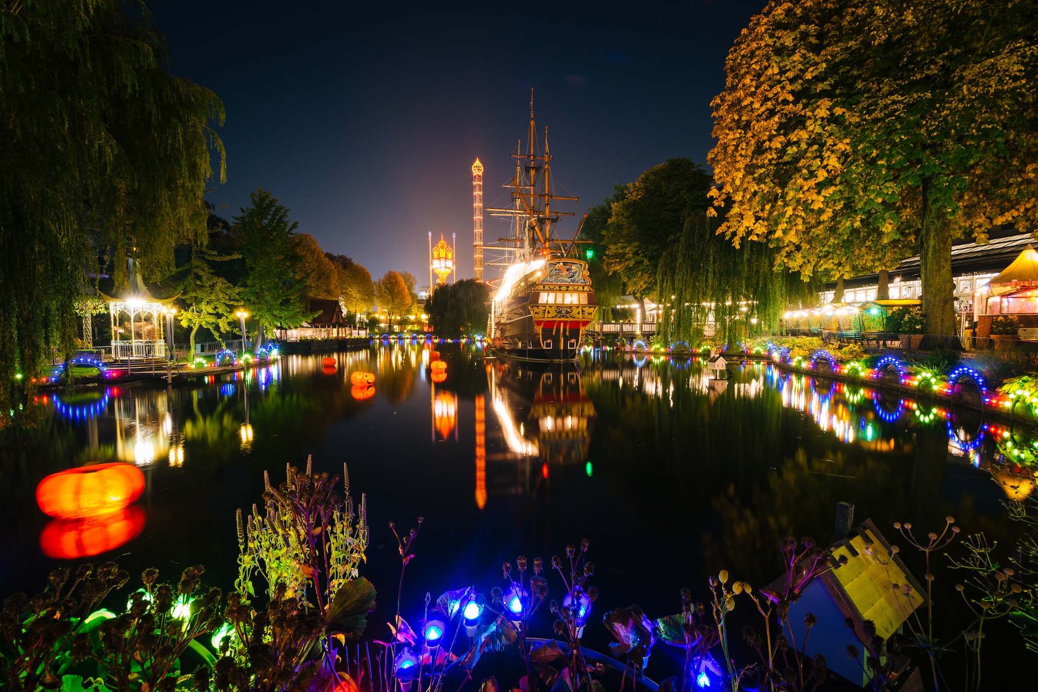 {"metadata_en_GB":{"alt-text":"The lake at Tivoli Gardens at night, in Copenhagen, Denmark.; Shutterstock ID 454369747; Invoice Number: -"}}