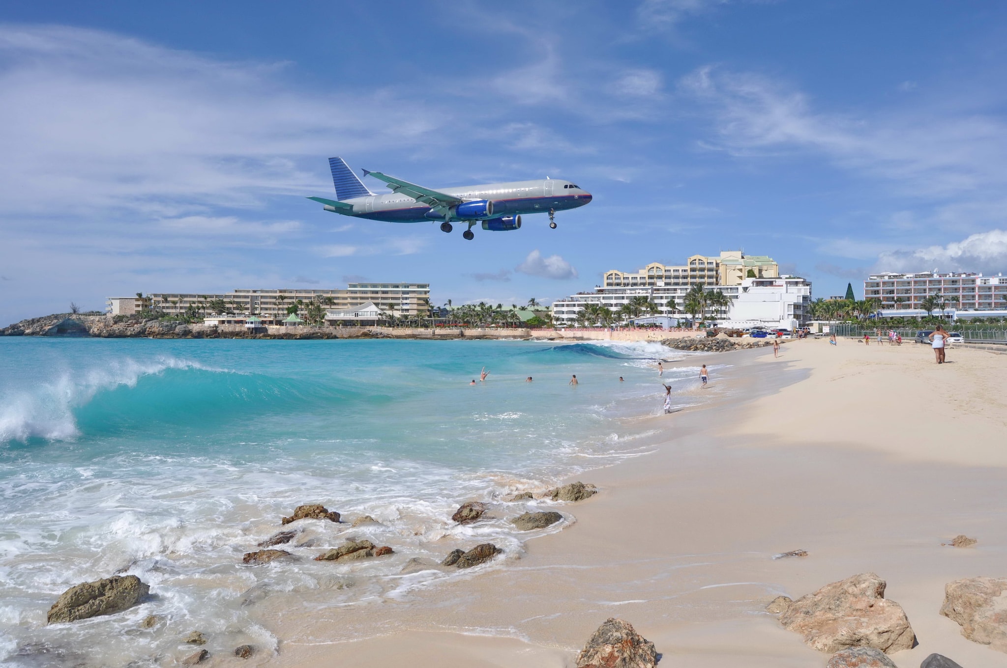 Airplane Landing above Maho Beach in St. Maarten Island; Shutterstock ID 736251334