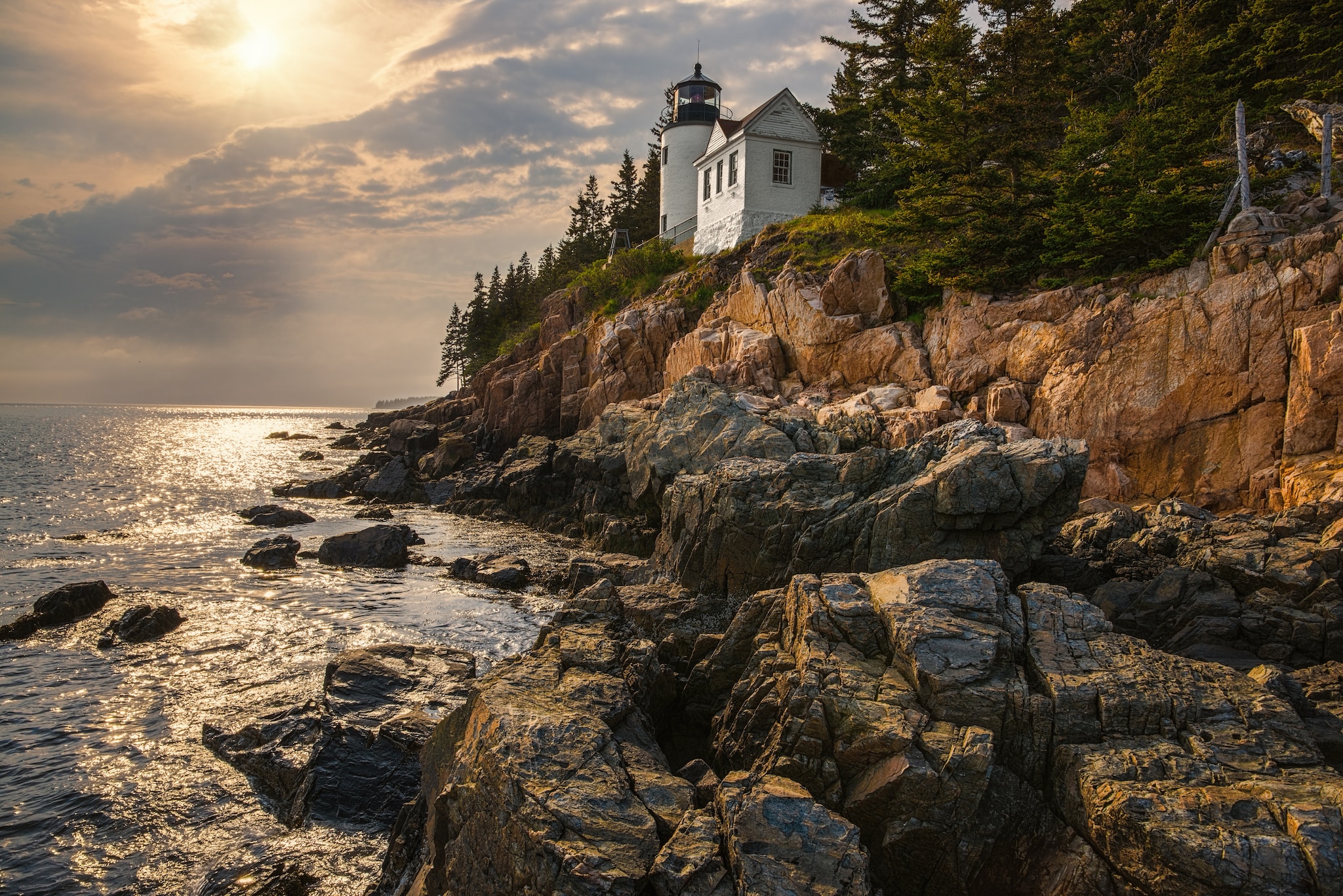 {"metadata_en_GB":{"alt-text":"A house on a cliff surrounded by rocks and water"},"metadata_en_AU":{"alt-text":"A house on a cliff surrounded by rocks and water"}}
