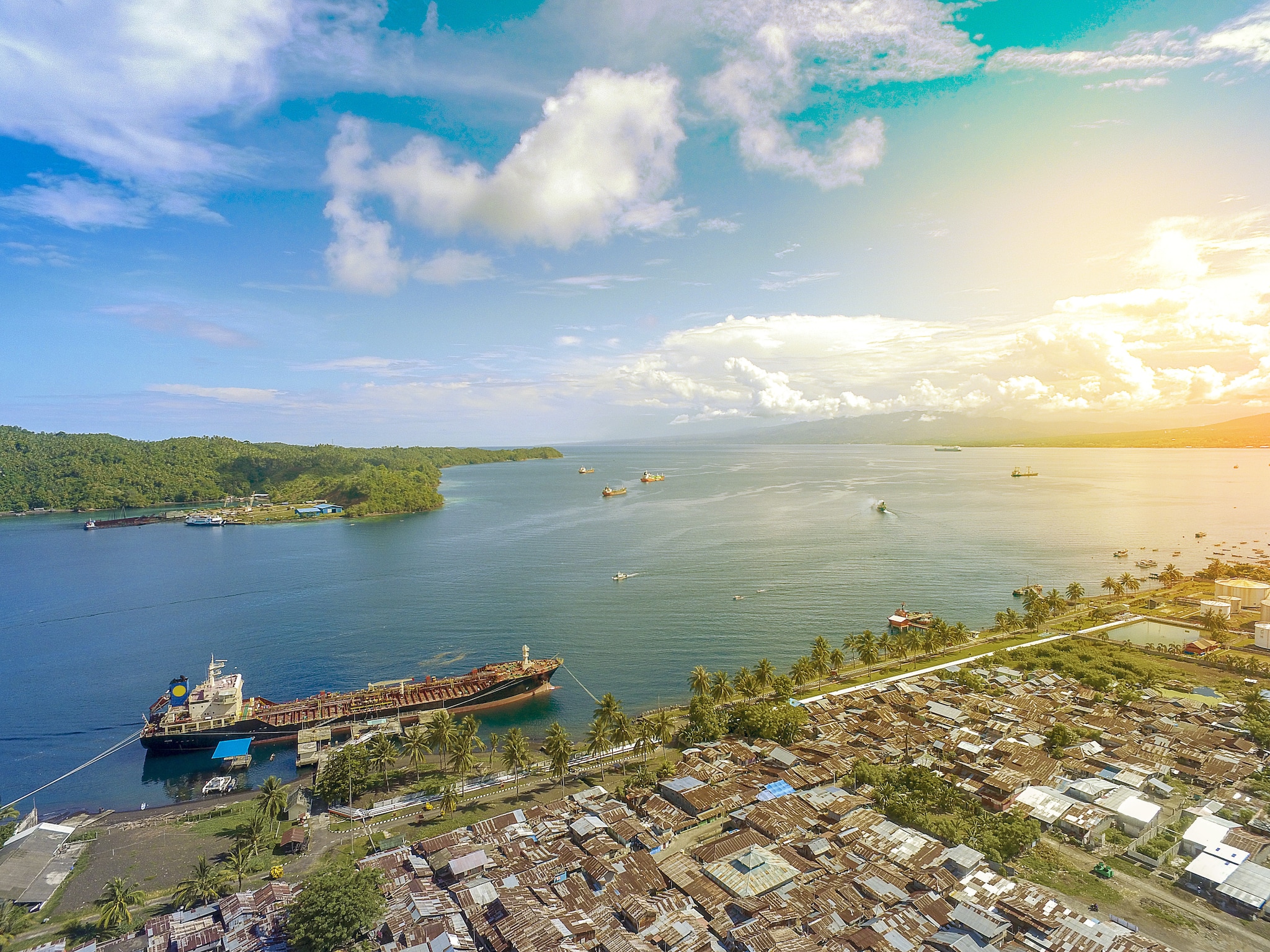 {"metadata_en_GB":{"alt-text":"Town of Bitung SUlawesi Utara aerial view. Island of Manado, Indonesia; Shutterstock ID 756811255; Invoice Number: -"}}