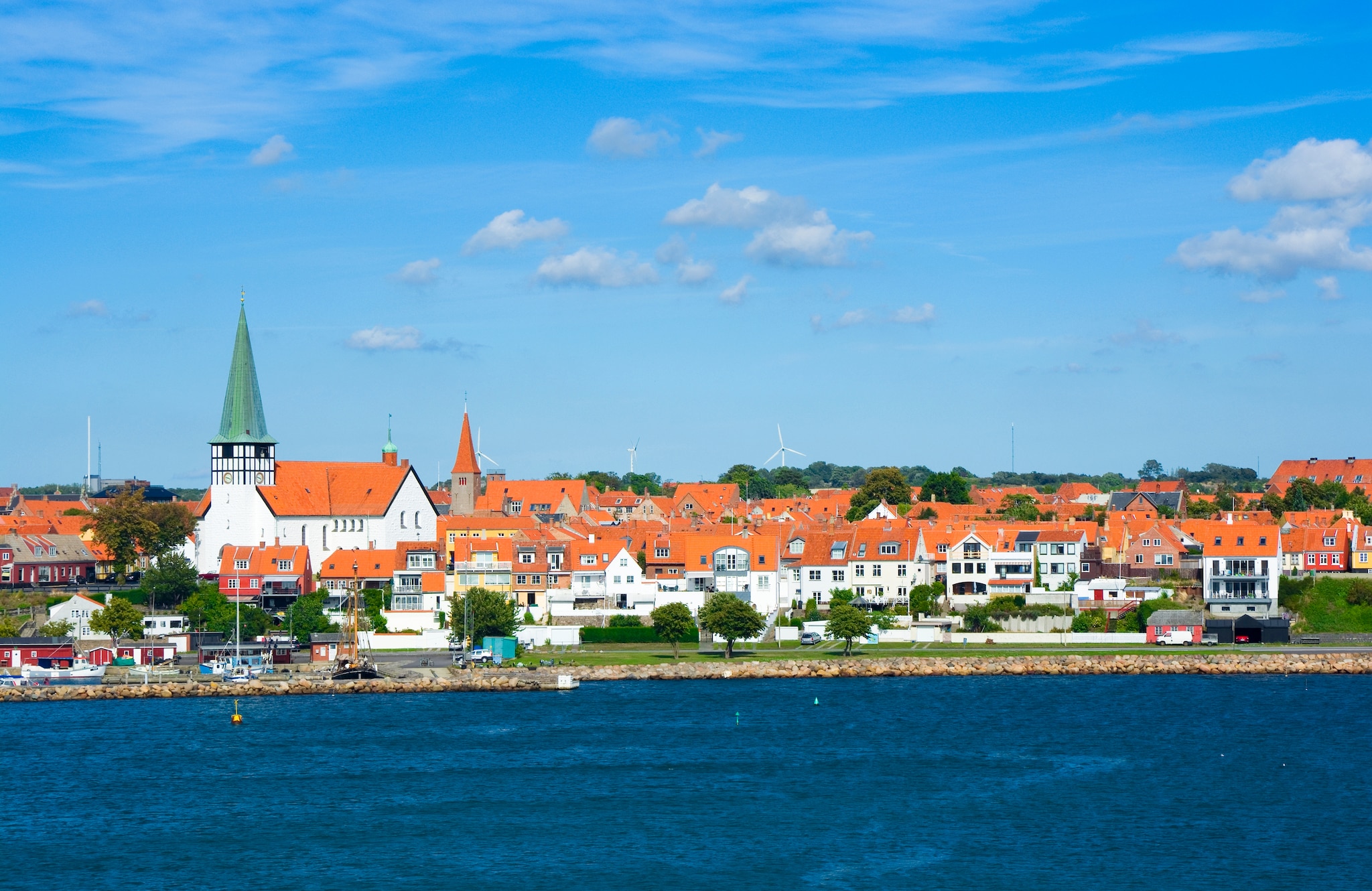 {"metadata_en_GB":{"alt-text":"Panorama of Ronne town from the harbor, St Nicolas Church on the left, Bornholm, Denmark; Shutterstock ID 1180668931; Invoice Number: -"}}