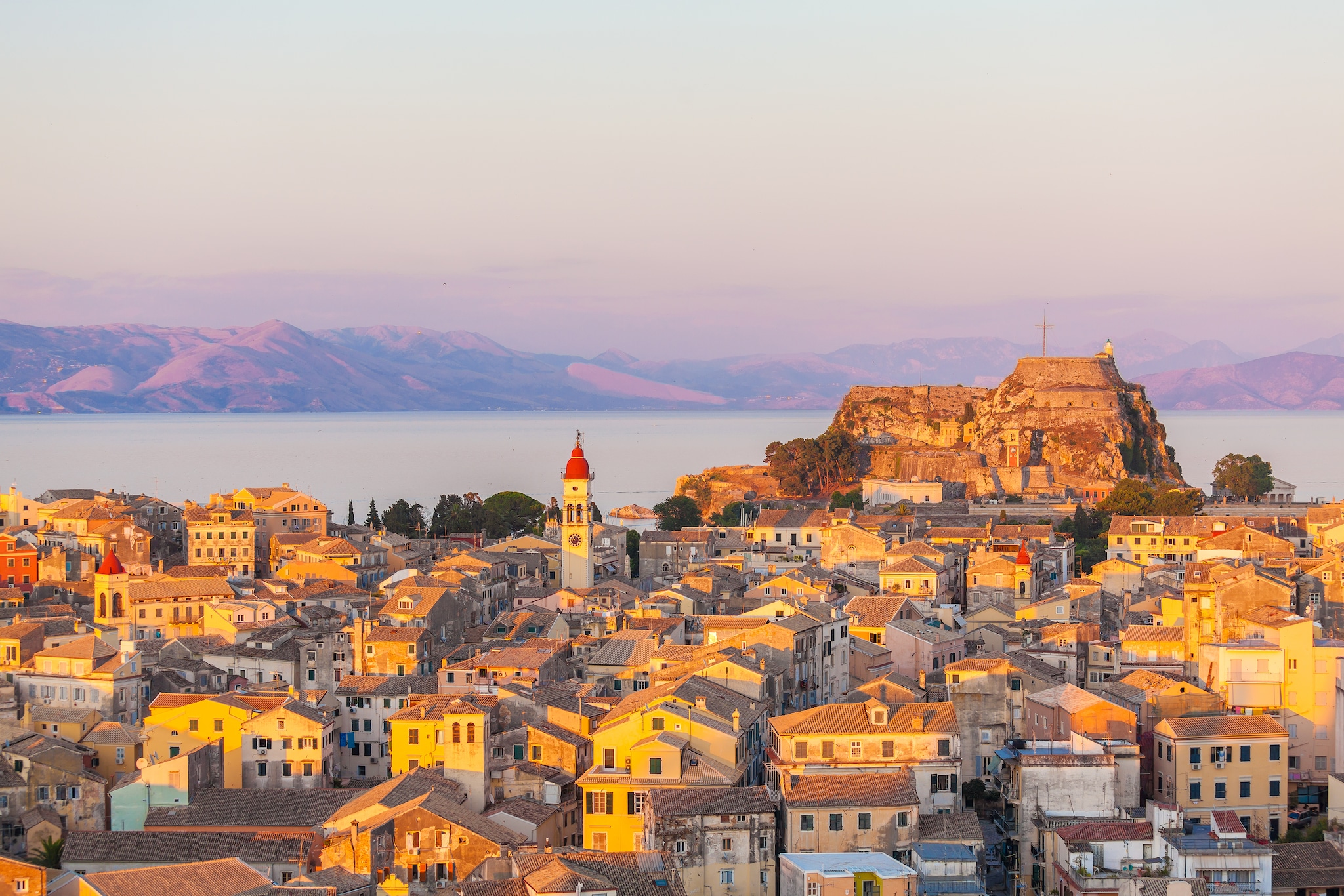 {"metadata_en_GB":{"alt-text":"buildings and castle overlooking sea"},"metadata_en_AU":{"alt-text":"buildings and castle overlooking sea"}}