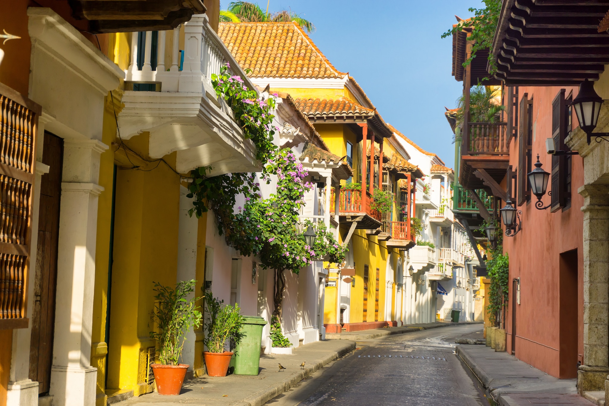 {"metadata_en_GB":{"alt-text":"Street with colourful buildings "},"metadata_en_AU":{"alt-text":"Street with colourful buildings "}}
