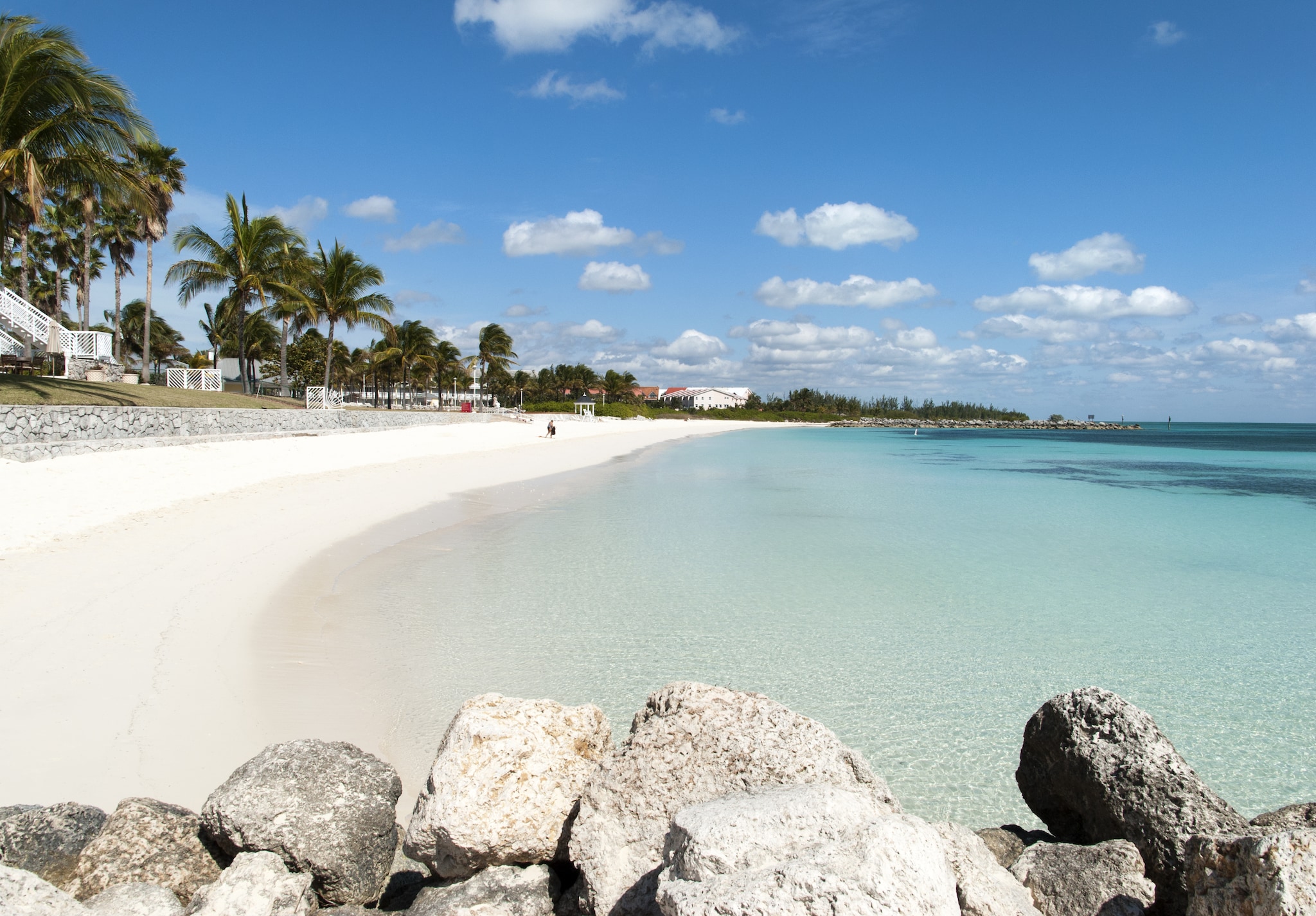{"metadata_en_GB":{"alt-text":"Rocks in front of a beautiful white sandy beach"},"metadata_en_AU":{"alt-text":"Rocks in front of a beautiful white sandy beach"}}