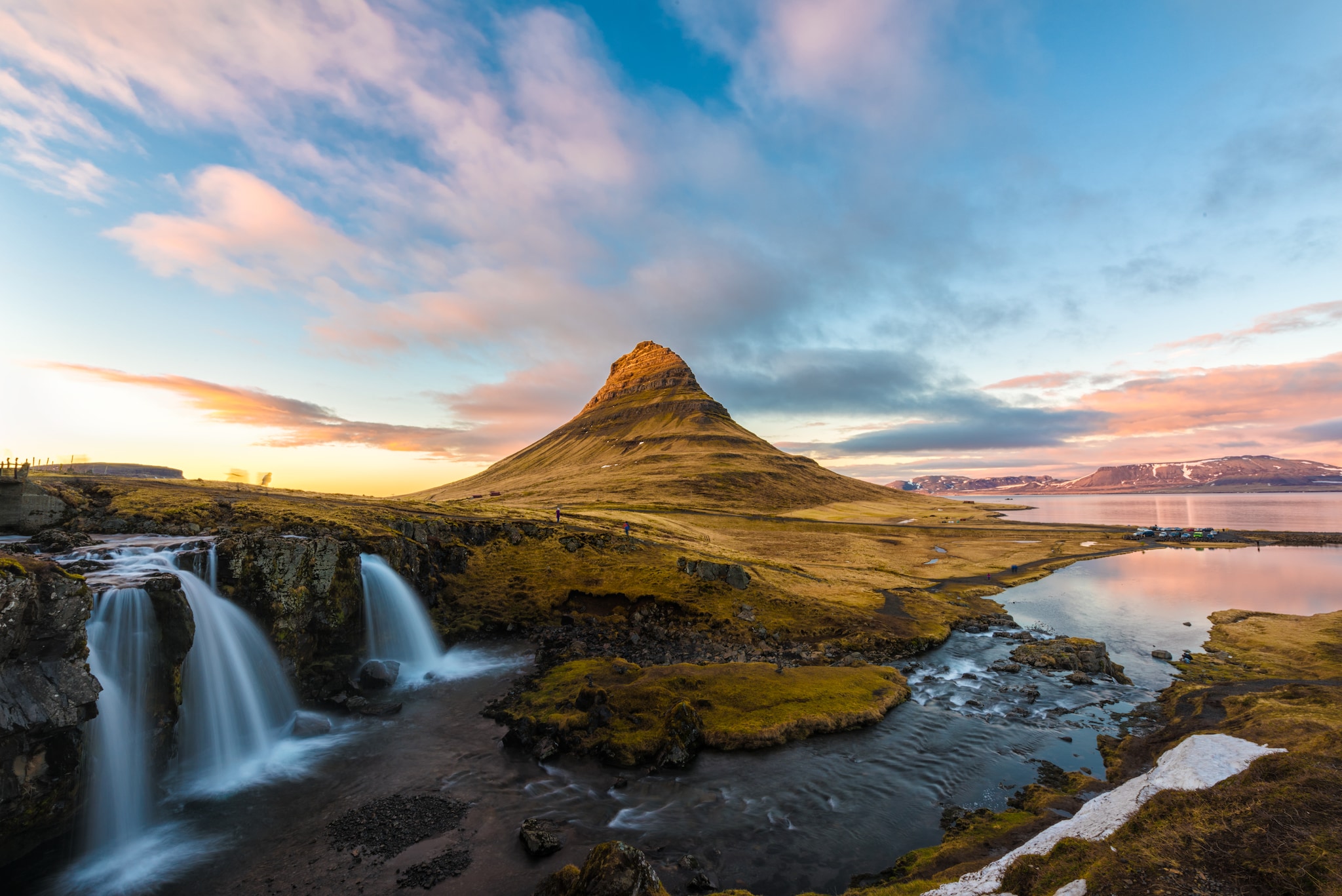 {"metadata_en_GB":{"alt-text":"Evening long exposure shot at Kirkjufell, Grundarfjordur town, West Iceland with the moving cloud over the mountain ; Shutterstock ID 615889553; Invoice Number: -"}}
