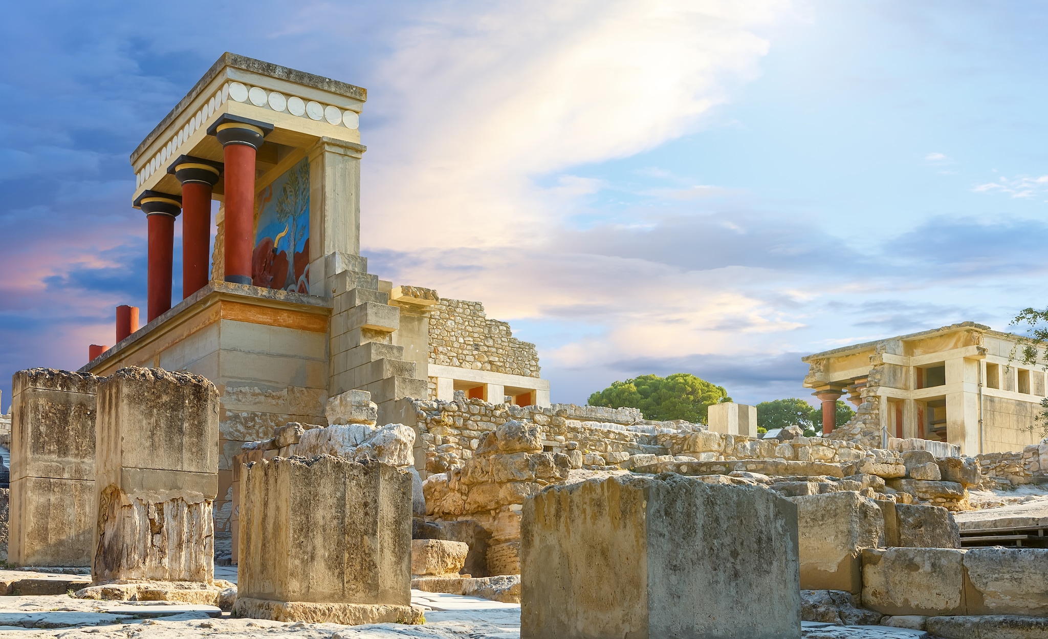 Knossos palace at Crete, Greece Knossos Palace, is the largest Bronze Age archaeological site on Crete and the ceremonial and political centre of the Minoan civilization and culture.