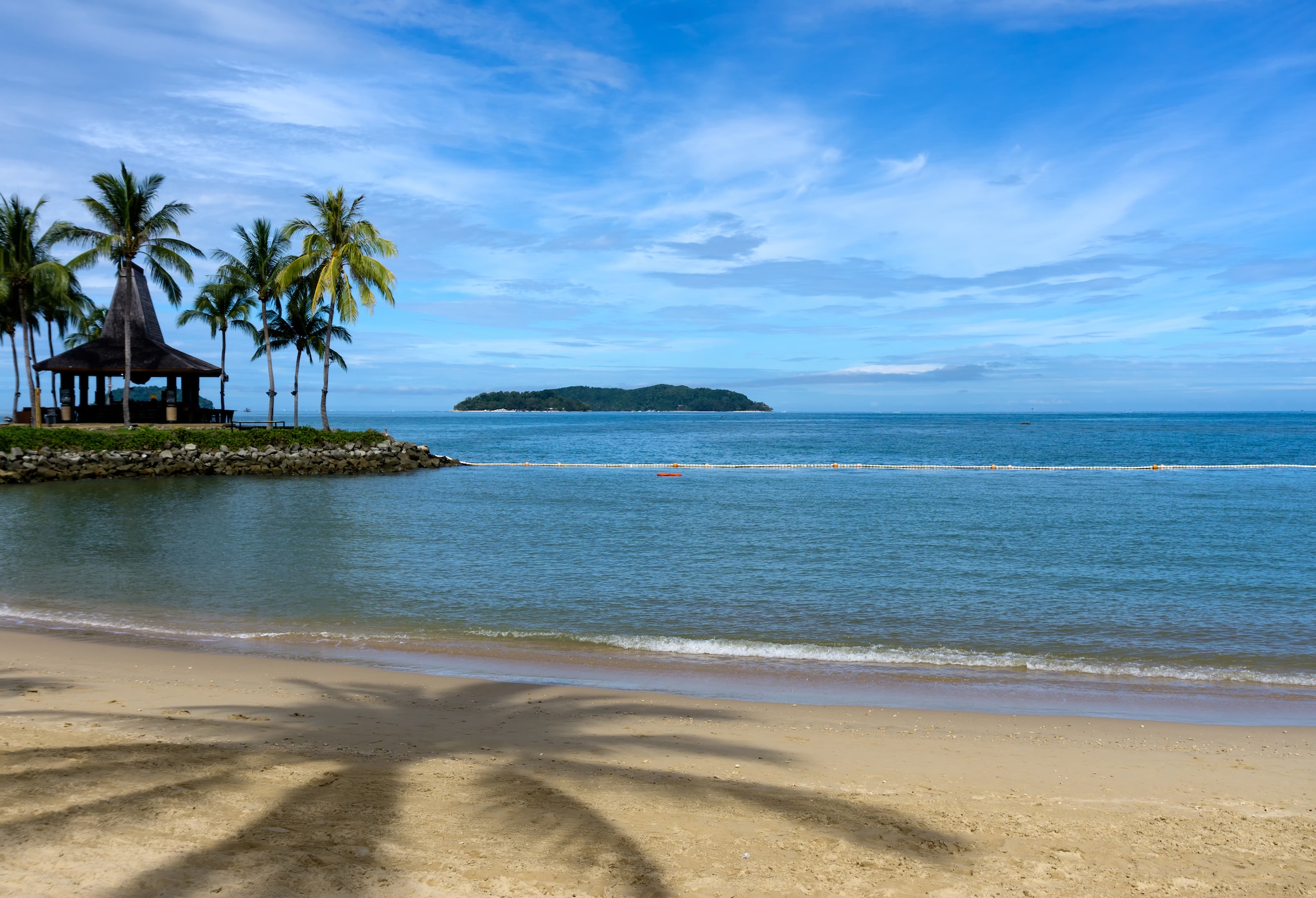 {"metadata_en_GB":{"alt-text":"Beach and palm trees in Kota Kinabalu, Sabah, Malaysia.; Shutterstock ID 596754974; Project: Adobe"}}