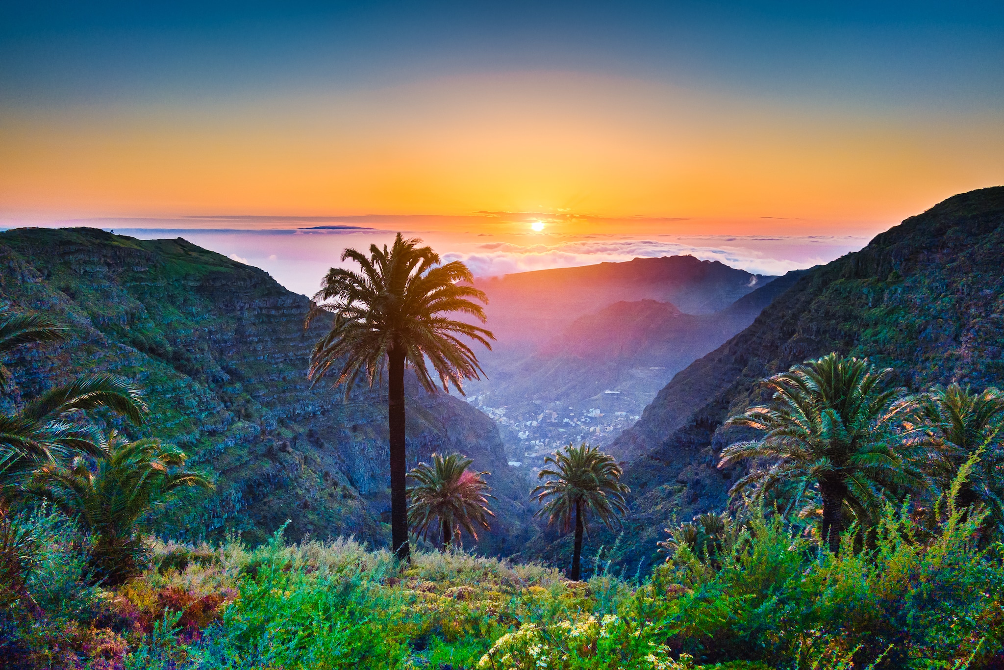 {"metadata_en_GB":{"alt-text":" Mountains infront of a bright sunset"},"metadata_en_AU":{"alt-text":" Mountains infront of a bright sunset"}}