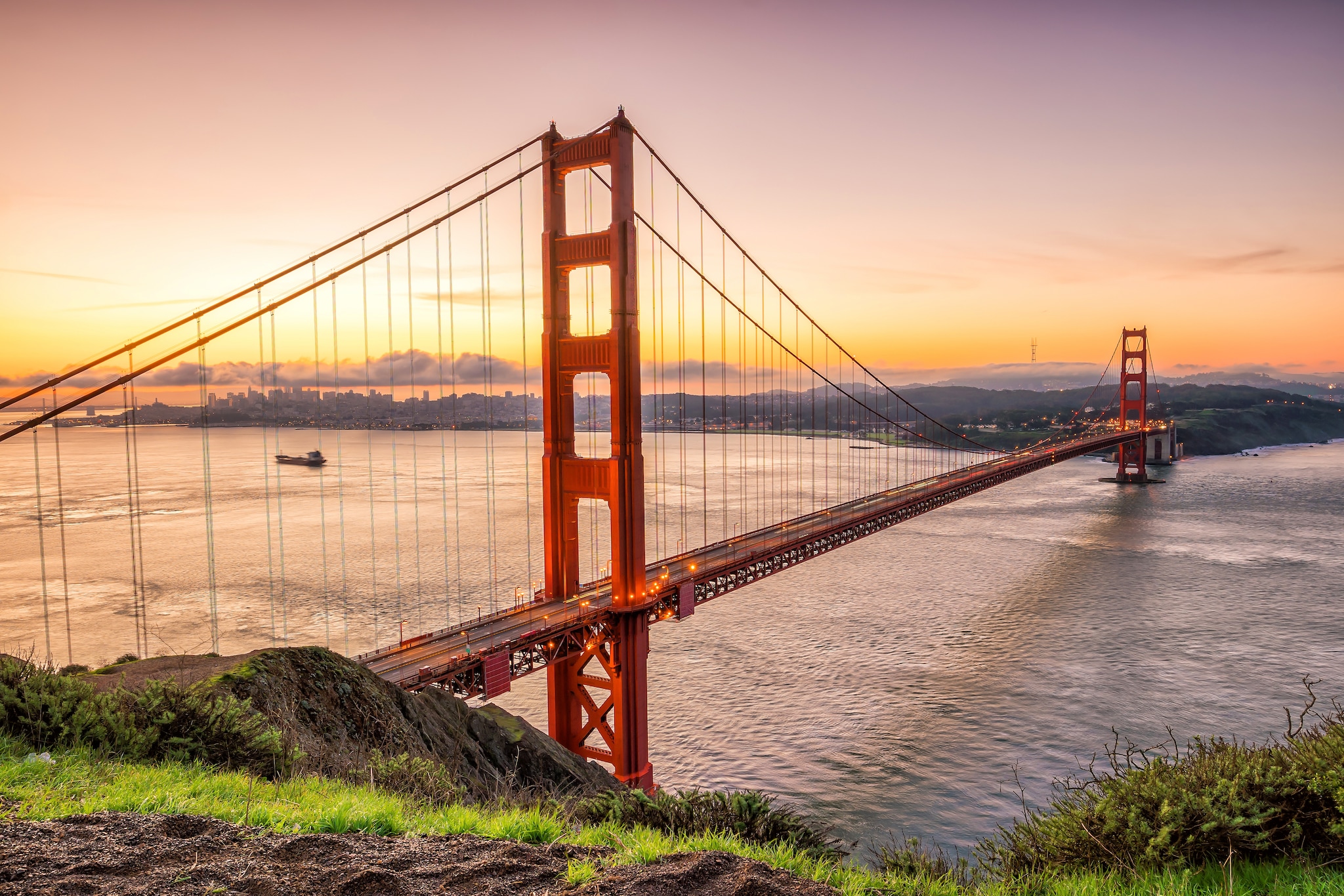 {"metadata_en_GB":{"alt-text":"Big red bridge connecting two sides of sea"},"metadata_en_AU":{"alt-text":"Big red bridge connecting two sides of sea"}}