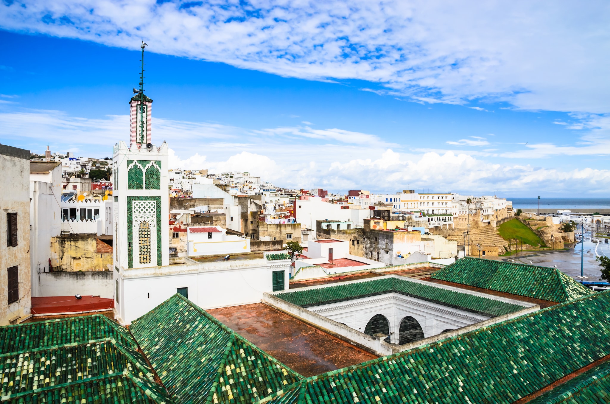 {"metadata_en_GB":{"alt-text":"Beautiful panorama of old medina in city Tangier, Morocco"}}