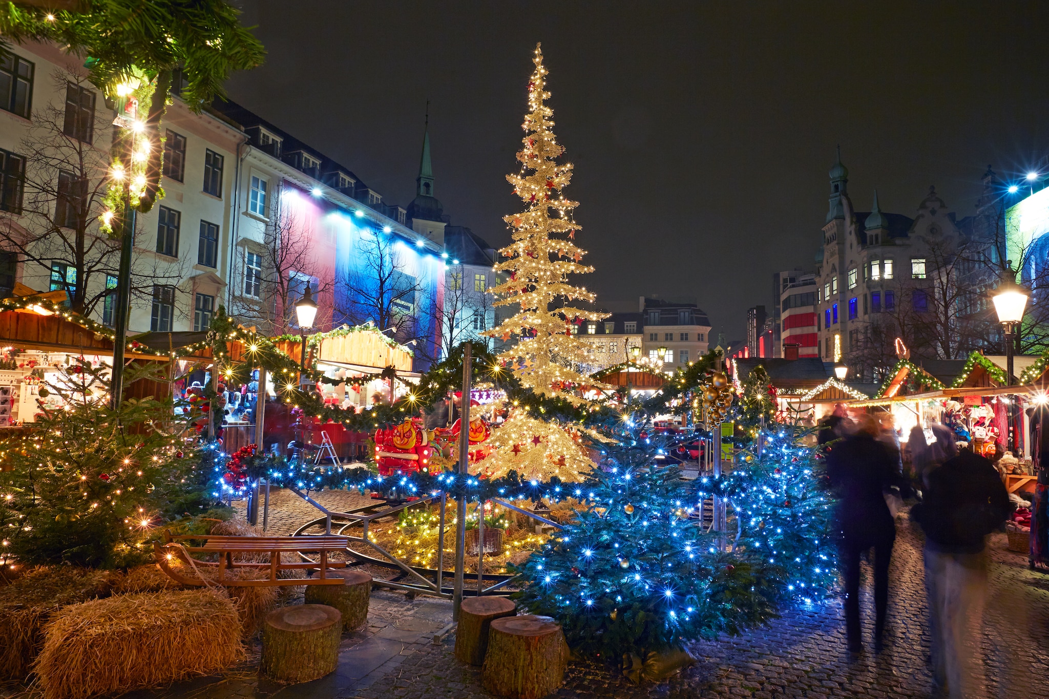 Christmas market illuminated at night in Copenhagen