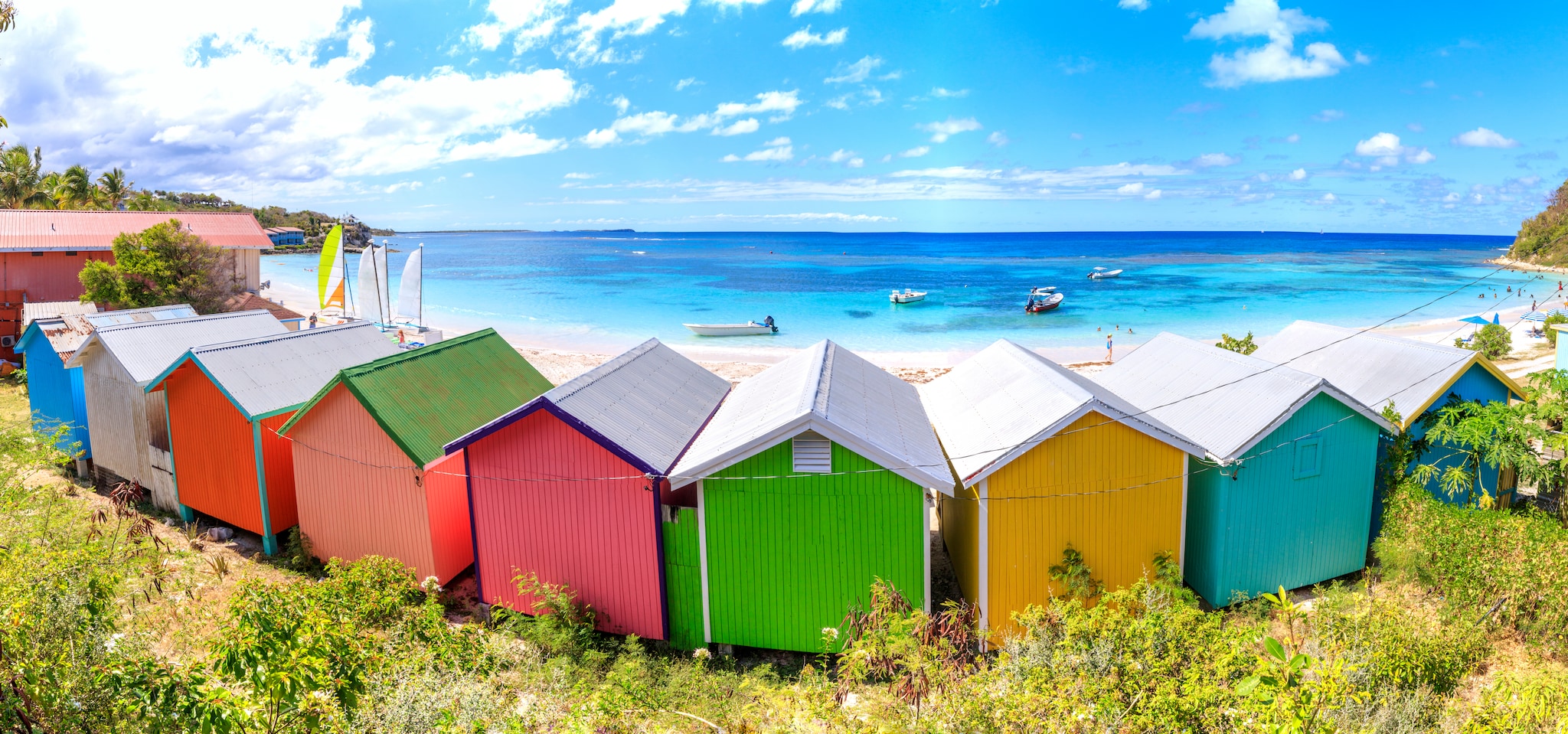 Panoramic of multi colored beach huts seafront, Long Bay, Antigua, Antigua and Barbuda, Caribbean, Leeward Islands, West Indies