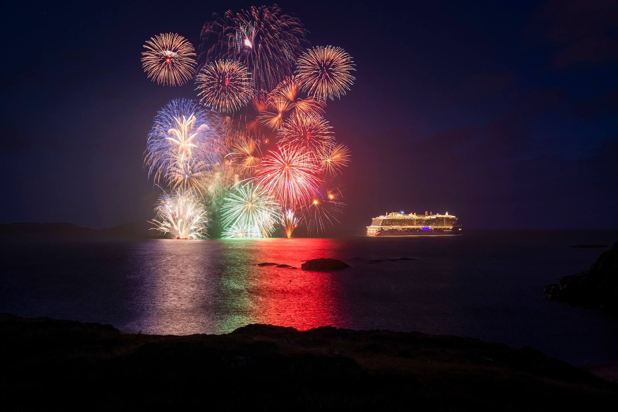 Immediate release: Monday August 9, 2021 - Editorial free to use image.

Fireworks celebrate maiden voyage of P&O Cruises Iona to namesake island

Britain’s largest and most environmentally-friendly cruise ship, P&O Cruises Iona, has embarked on its maiden voyage visiting its Scottish namesake island with a fireworks display as the highlight of celebrations.

P&O Cruises President Paul Ludlow said: 

“Iona’s maiden voyage is the start of a new era in travel as Britain’s most environmentally-friendly cruise ship, the first in the country powered by liquefied natural gas, sets sail.

“For this special maiden voyage we wanted to bring guests to the island of Iona which has influenced many aspects of the ship – the sense of space in the SkyDome through to our gin still named “Columba”, the heather in our Marabelle gin distilled on board and, of course, the name of the ship.”

Iona’s first-ever cruise is currently sailing around the UK coast, for seven nights, having departed P&O Cruises home port of Southampton on August 7, 2021.

The ship is at anchor adjacent to the island of Iona ahead of commencing scenic cruising around the Isle of Colonsay, Lochbuie, Duart Castle, Tobermory, Bac Mòr, Fingal’s Cave, Sound of Jura, Claggain Bay, Mull of Kintyre and Sanda Island.

Iona also features the first gin still on a cruise ship, created in association with Salcombe Gin, distilling tailor made spirit on board. The gin’s maiden production will take place in Iona’s custom-made still and will be distilled, bottled and labelled on board.

Gary Barlow is music director of Iona’s 710 Club. This atmospheric late-night music venue will offer an opportunity for up-and-coming musicians to get their break.

Spectacular aerial shows have also been especially devised for Iona, the brainchild of Canadian entertainment company Creativiva. The ship’s stunning design, featuring a two-deck glass SkyDome, has been the inspiration for one of the shows, Rise, created
