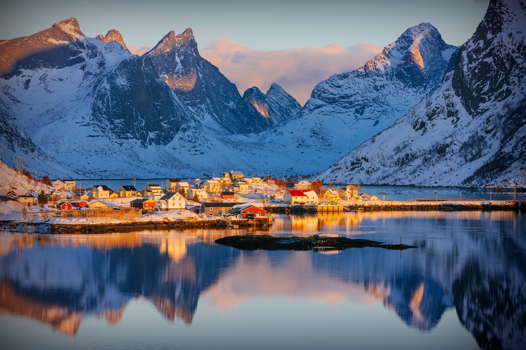 {"metadata_en_GB":{"alt-text":"Colorful winter sunrise in the fishing village of Reine, Lofoten archipelago, Norway, above the arctic circle; Shutterstock ID 690713842; project: Deals; job: ; client: pocruises; other: "}}