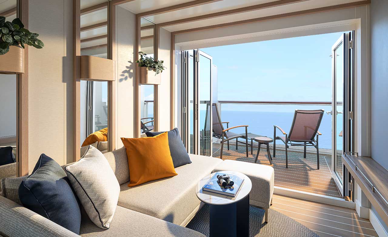 {"metadata_en_GB":{"alt-text":"Conservatory Mini-suite with balcony doors open"}}