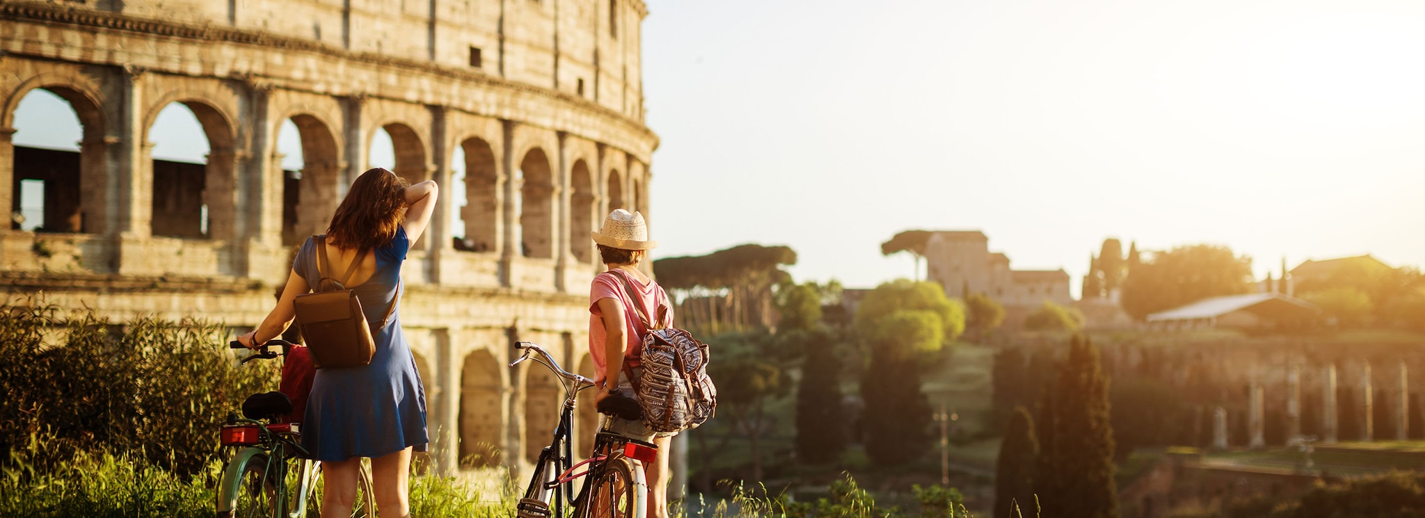 Tourist women in Rome: by the Coliseum.